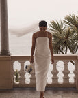 Textured chiffon midi length bridal dress with spaghetti straps